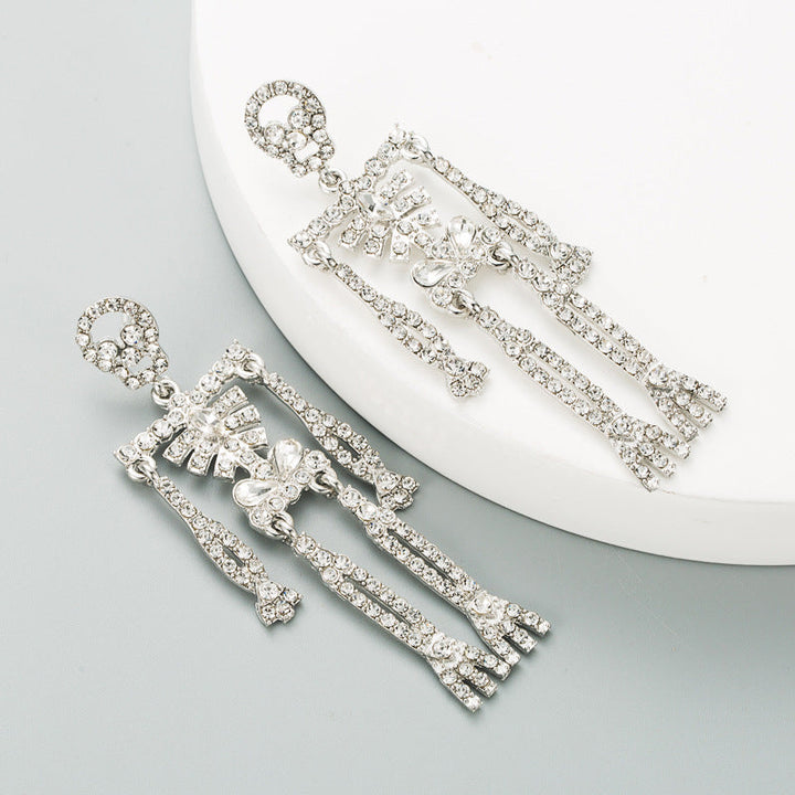 European and American style skull skeleton alloy inlaid rhinestone earrings female personality long exaggerated earrings earrings