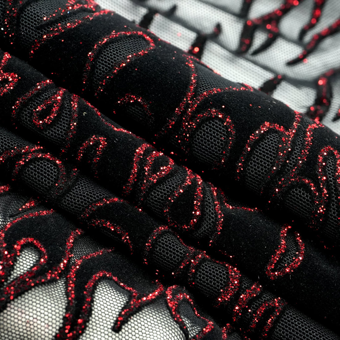 Fiery Glittered Flocked Stretch Mesh Fabric | Blue Moon Fabrics