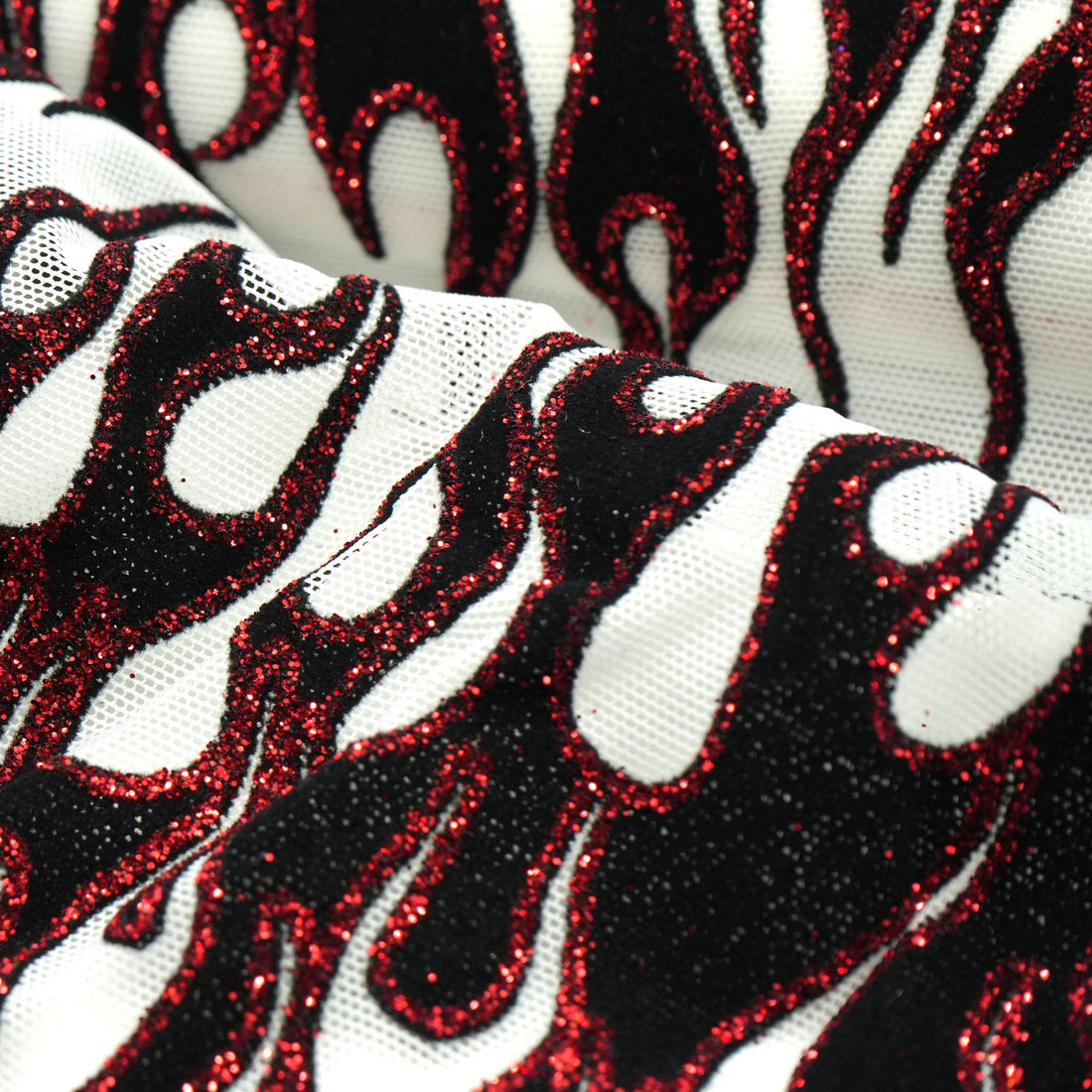 Fiery Glittered Flocked Stretch Mesh Fabric | Blue Moon Fabrics
