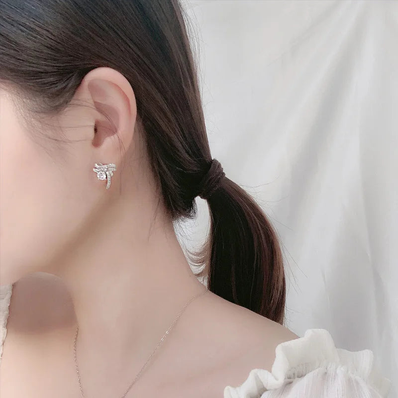 Moissanite Bow Stud and Drop Earrings in Sterling Silver